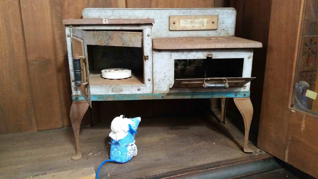 Millie with toy stove
